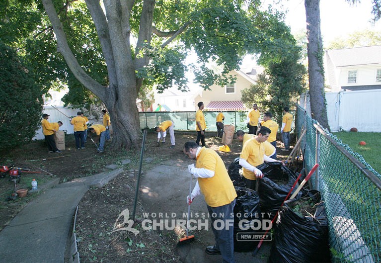 Helping Neighbors in Bogota With Yard Work